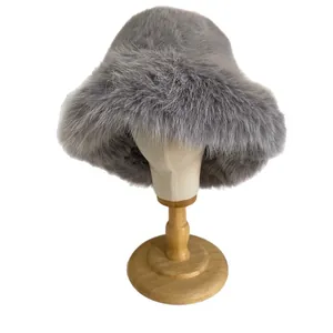 Plush faux fur bucket hat in neutral grey with thick warm lining for women