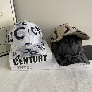 Distressed vintage baseball caps with letter print in white, khaki, and dark grey