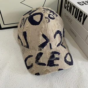Distressed vintage beige baseball cap with black letter prints for outdoor sun protection