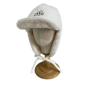 Winter thermal trapper hat in white fleece with embroidered logo for outdoor skiing
