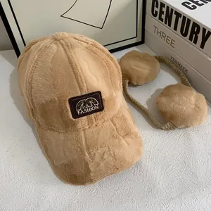 Detail view of khaki plush baseball cap and earmuffs set with fashion logo patch