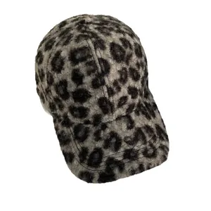 Winter leopard print baseball cap in grey faux fur with warm plush texture