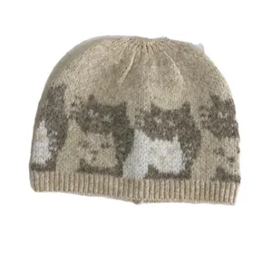 Beige knitted beanie with grey cat pattern and ribbed brim for women and men