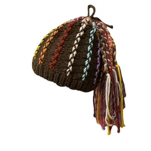 Brown knit beanie with colorful dreadlock tassels and vertical stripes for women