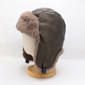 Detailed side view of vintage brown faux leather trapper hat with thick faux fur lining