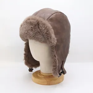 Detail of vintage faux leather aviator hat with thick plush lining and chin strap buckle