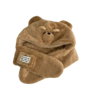 Plush brown bear ear hat and scarf set made of soft faux fur for winter warmth