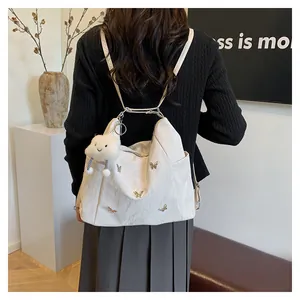 Détails du sac à dos plissé blanc avec papillons dorés et pendentif nuage en peluche