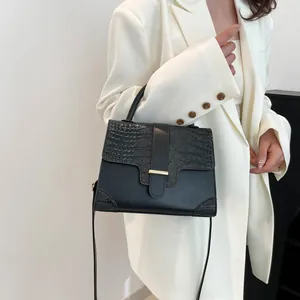 Elegant black crocodile embossed handbag with gold clasp for women stylish shoulder bag