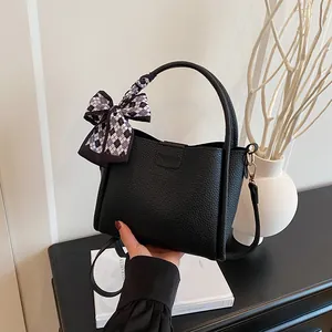 Retro black bucket bag with lychee pattern, fashion bow scarf and shoulder strap