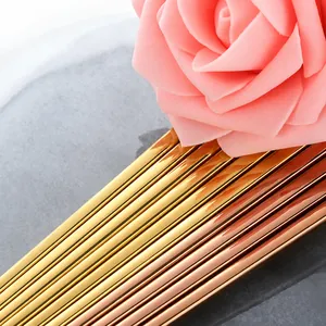 Detailed close-up of premium 304 stainless steel chopsticks in gold and rose gold finish