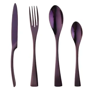 Polished purple stainless steel cutlery set with modern dinner knife fork and spoons