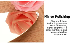 Macro detail of mirror polished 304 stainless steel spatula reflecting a pink flower