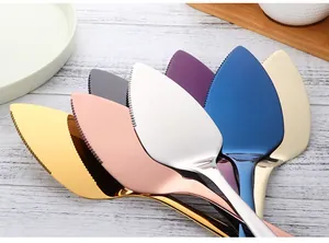Detailed view of colorful stainless steel cake servers with serrated edges for easy cutting