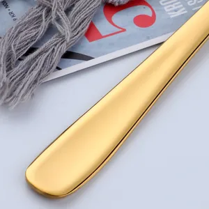 Polished gold stainless steel lotus turner kitchen spatula for elegant cooking and serving