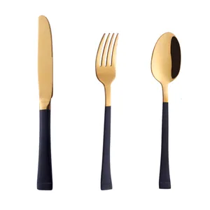 Set de couverts modernes en acier inoxydable 304 avec têtes dorées et manches noirs