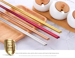 Detailed macro view of 304 stainless steel long chopsticks in four metallic colors