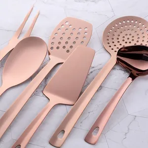 Rose gold stainless steel kitchen utensil set with ergonomic waterdrop handles on marble