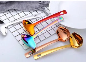 Detailed view of polished 304 stainless steel spoons in various colorful plating finishes