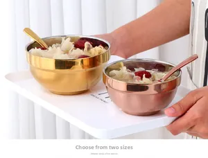 Detail of insulated 304 stainless steel bowls and spoons in gold and rose gold finishes