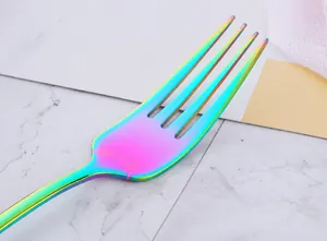 Macro view of rainbow iridescent 304 stainless steel dinner fork with high polish finish
