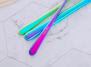 Close-up of rainbow plated SUS 304 stainless steel handles with laser engraved logo