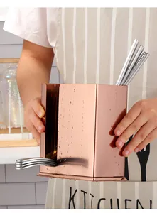 Rose gold stainless steel utensil holder with dual compartments and drainage side openings