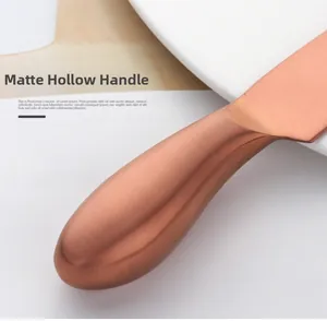 Detailed macro view of the rose gold matte hollow handle on the stainless steel cheese knife