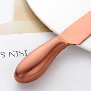 Rose gold brushed stainless steel cheese knife handle with sleek ergonomic design