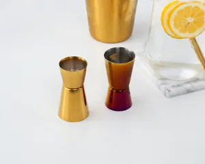 Dual-sided gold and rainbow stainless steel jiggers showing 15ml and 30ml measurements