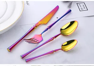 Detail of 4-piece 304 stainless steel cutlery set with iridescent purple and gold gradient