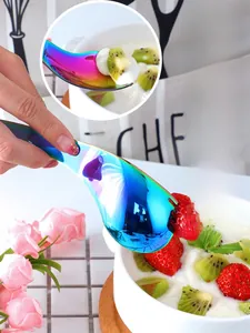 Rainbow spork showing functional curved handle design for dessert and salad use