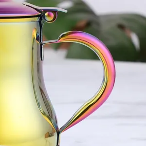 500ml iridescent stainless steel oil dispenser with handle and lid in close-up view