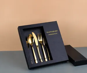 Detail von 4-teiligem goldenem Edelstahl-Besteckset in einer schwarzen Geschenkbox