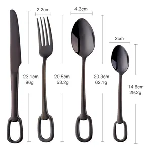 Detail view of black matte stainless steel cutlery set with unique ring handle design