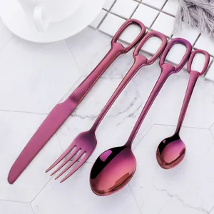 Detailed macro view of purple gradient 304 stainless steel cutlery set with ring handles