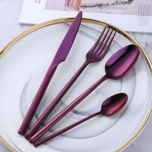Deep purple stainless steel cutlery set with V-shaped handles in a 4-piece collection