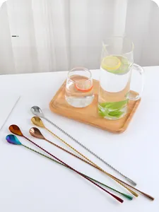 Macro view of spiral handles and colorful finishes on 304 stainless steel bar spoons