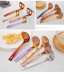 Macro detail of colorful stainless steel potato mashers with ergonomic hanging handles