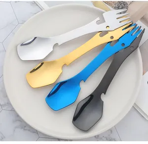 Macro shot of 4-in-1 stainless steel camping utensils showing fork, spoon and opener