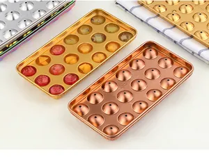 Detailed macro view of 18-hole SUS304 stainless steel ice ball molds in various metallic colors