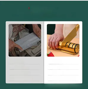 Detailed view of a golden 3-stage knife sharpener being used with a chef's kitchen blade