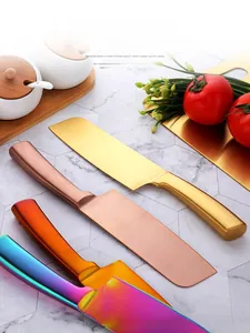 Macro view showing colorful titanium plated chef knives in gold rose gold and rainbow finish