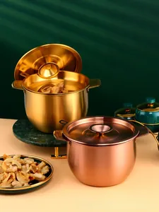 Detail of 304 stainless steel oil storage pot with fine mesh filter in gold finish