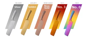 Detail view of five multi-color stainless steel kitchen cleavers in matte metal finishes