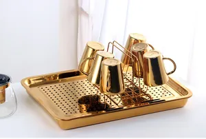 Golden stainless steel drainage tray set with matching cups and rack for home use