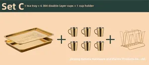 Close-up of golden stainless steel tray set with 6 double-wall cups and cup rack