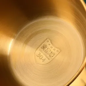 Golden 304 stainless steel oil bowl interior view showing food grade safety stamp