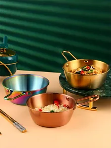 Detailed close-up of 304 stainless steel bowls in gold, rainbow, and rose gold finishes