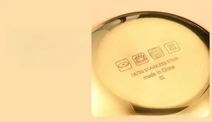 Bottom of 18/10 stainless steel pot with icons for induction and gas stove compatibility